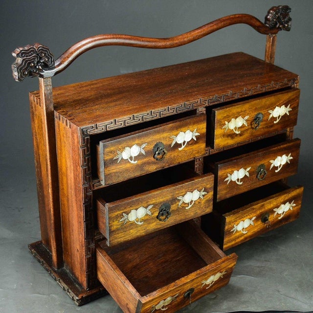 Add a touch of imperial elegance to your home with this stunning vintage Chinese six-drawer chest (Ti Gui). This piece is...