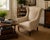 A study in refined craftsmanship, this wingback chair by Kravet exemplifies the sophistication of bespoke furniture...