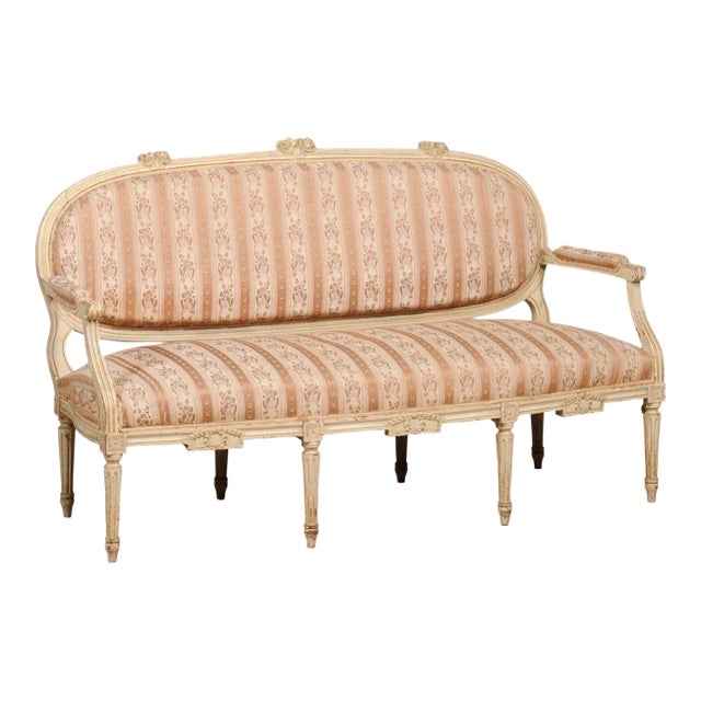 1790s Louis XVI Period French Painted Sofa with Oval Back and Carved Foliage For Sale