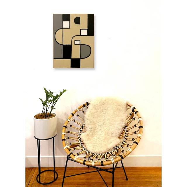 This abstract acrylic painting is inspired by the mid-century masters and created in a neutral palette. Framed in a modern...