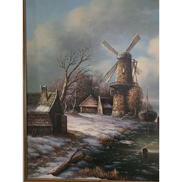 vintage mid to late 20th century oil on canvas landscape painting, Dutch winter windmill scene, with frozen canal. signed...