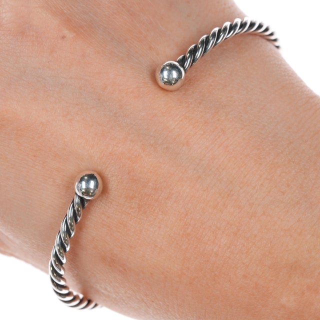 7.5" Retired James Avery Twisted rop cuff bracelet sterling silver. Weight and measurements in pics. Selling the exact...