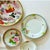 Set of 7 Mid‑Century Japanese and Chinese Hand‑Painted Floral Plates A lovely mixed collection of mid‑century Japanese and...