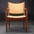 1960s Hans J. Wegner armchair model 713 in tanned patinated oak and leather made by Johannes Hansen. The chair is evidence...