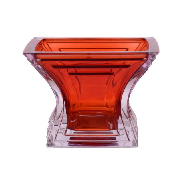 Large four inch Mikasa votive or tealight candle holder in a Deco style design with clear fluting over deep ruby red....