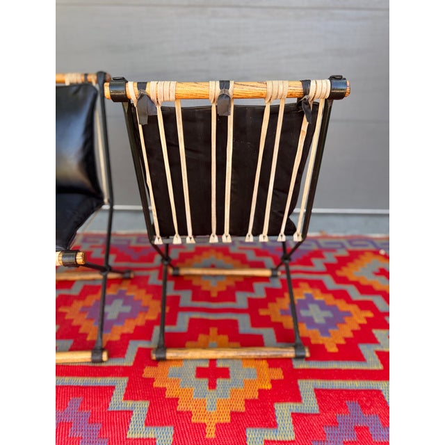 Super cool set of 2 Cleo Baldon Wrought Iron and Wood Chairs from the 1960s. Wrought iron and oak frame X-form chairs with...
