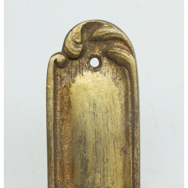 French style narrow keyhole door back plate made of brass with a gilded finish. The original mounting screws are not...