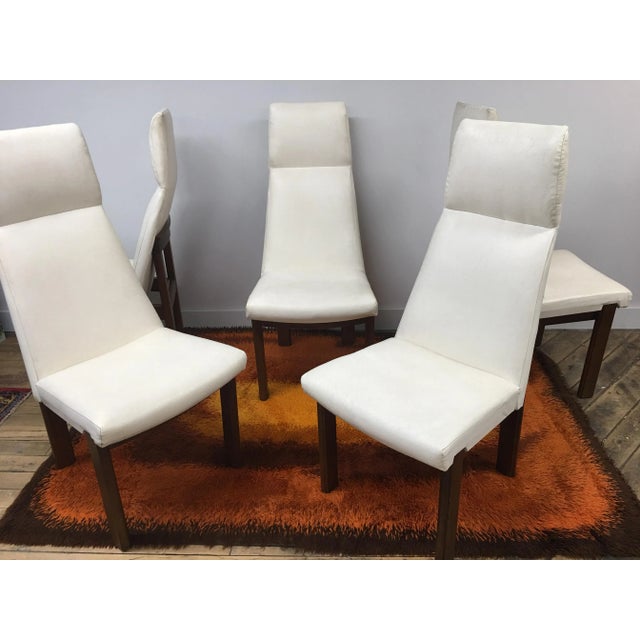 This great set of 5 Mid Century Modern white dining chairs comes to you in great vintage condition. The bodies are...