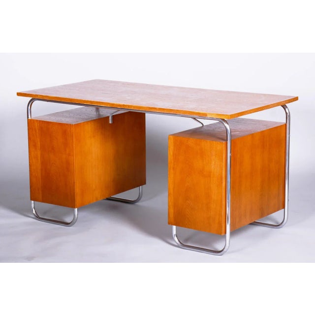 Made by Mücke Melder, an influential modernist furniture manufacturer specializing in tubular steel designs. It has been...