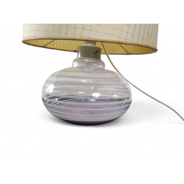 Lilac glass table lamp with double lighting (upper and lower) from the 70s. Dimensions 66 x 45 cm Tested and working....