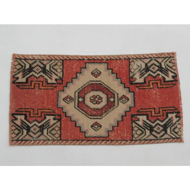 Vintage handknotted decorative mini rug from Konya region of Turkey. Approximately 50-60 years old. In very good condition.