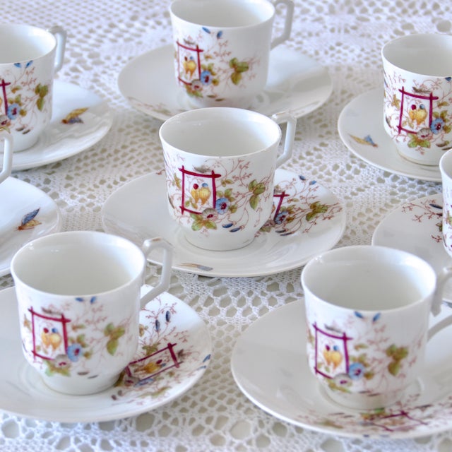Magnificent old coffee service for 8 people, in fine porcelain, polychrome St Terre de Fer. Pretty decoration of a couple...