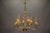 Rare 1970s murano chandelier with golden accents – a striking statement piece of italian design. A stunning italian murano...