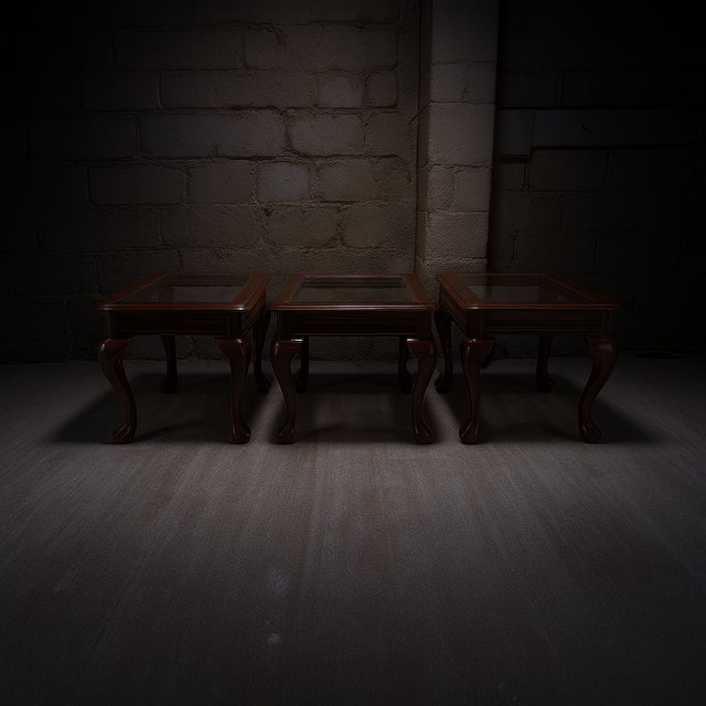 This impressive set of 3 vintage mahogany claw-foot end tables delivers bold, traditional character with unmistakable...