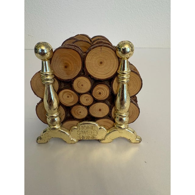 How cute is this set of log wood coasters from the 1970's with the two andirons holding the 6 log coasters which were made...