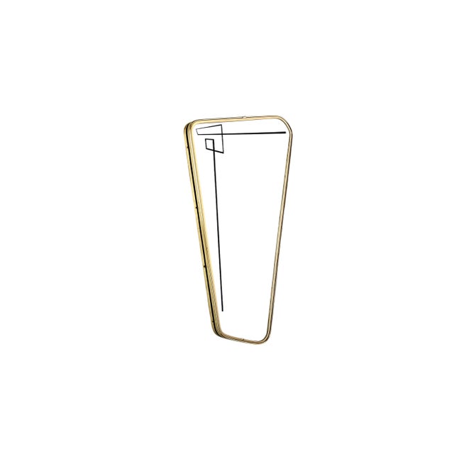 Asymmetrical mirror from the 1960s with a geometric line decor. This elegant mirror has a white and gold edge with a black...