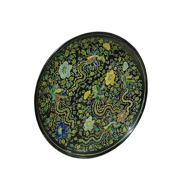 The Chinese Black Base Mixed Color Phoenix Graphic Porcelain Plate Display is a vintage reproduction of Qing dynasty style...