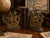 Bring timeless maritime elegance to your home library with this striking pair of vintage cast iron Spanish Galleon...
