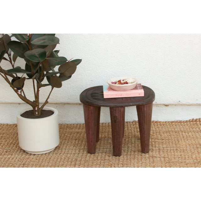 A unique piece of African art, this vintage Nupe table from Nigeria is a must-have for collectors and enthusiasts of Nupe...