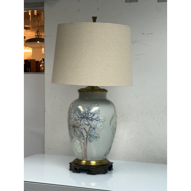 Design Plus Gallery presents Vintage Chinoiserie Floral Ceramic Table Lamp. This ginger jar form lamp displays a glazed...