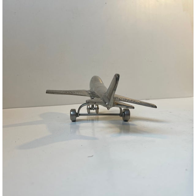 A late 1970s model of a Boeing Air Plane. Probably a Jumbo Jet - Type 747 that was launched in 1969. The plane itself is...