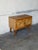This versatile storage piece features two parquet paneled doors and an internal shelf for organization. Crafted in Denmark...