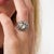 This exceptional Art Deco diamond ring is a striking jewel from the 1930’s, centered by a rose cut diamond weighing...