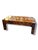 A bold statement piece with serious vintage character. This rectangular coffee table features a rich tortoise shell-style...