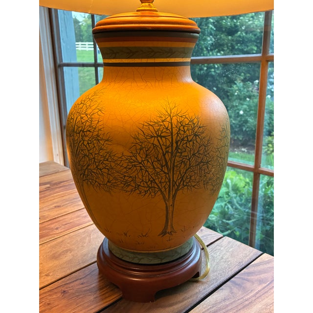Offering a beautiful, highly collectible vintage ceramic table lamp designed by Bob Timberlake. This piece features a...