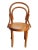 An authentic bentwood kid's chair made at the beginning of the 20th century by the Thonet Furniture company - and known as...