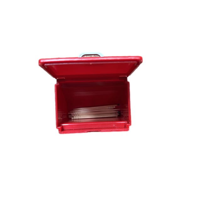 Vintage Coca-Cola branded toothpick dispenser in classic red with “Drink Coca-Cola” and “Ice Cold” graphics. Designed in...