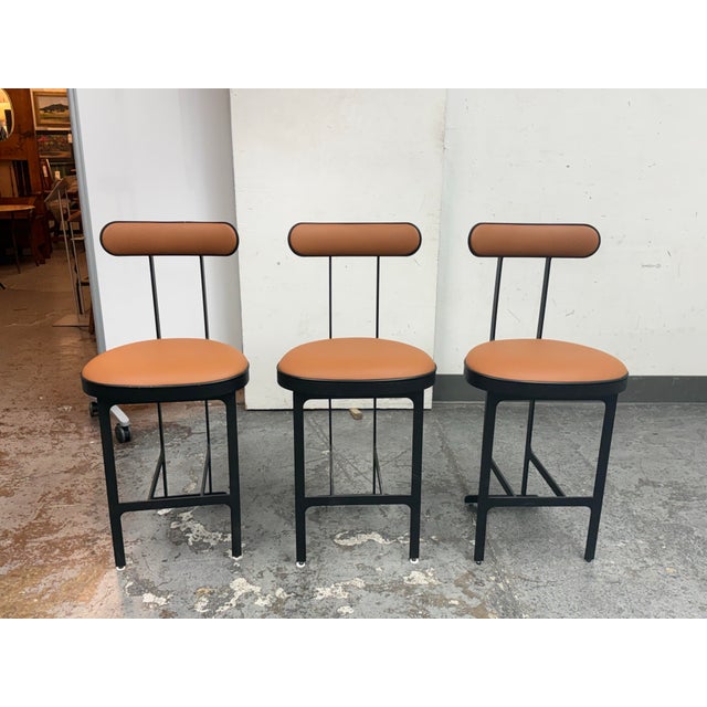 Design Plus Gallery presents a Set of Three Swivel Counter Stools from Michael Oren Design. These stools are in the style...