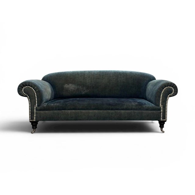 George Smith Tight Back Fixed Seat Elverdon Sofa and Loveseat in blue velvet on turned legs and chrome casters with chrome...