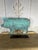 A striking vintage copper pig sculpture featuring a beautifully aged verdigris patina and charming folk art character....