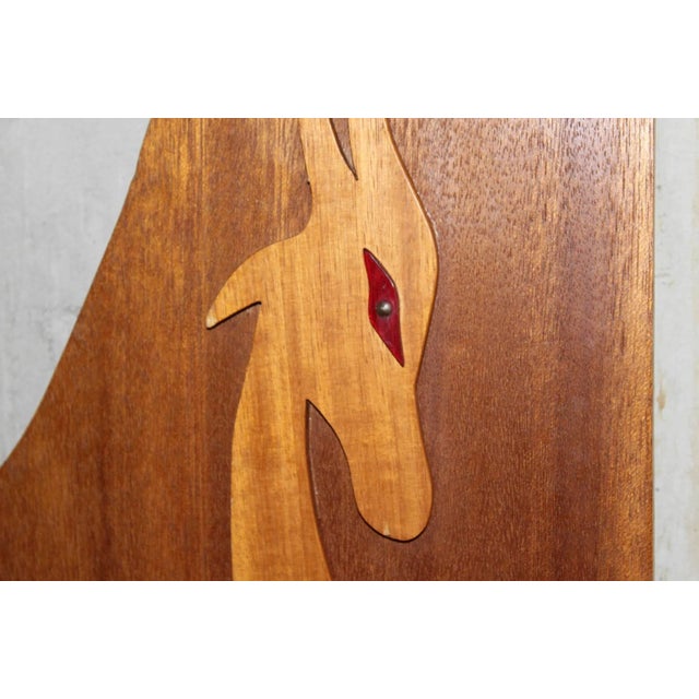 Pair of Gazelle wood art for mounting. This pair is nicely book matched and features a raised wood animal with red acrylic...