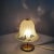 An elegant and iconic italian modernist table lamp, attributed to the prestigious "la murrina" factory in murano. A true...