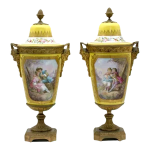 Bronze Mounted Porcelain Covered Urns - a Pair