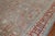 An early 20th century Persian Bibikabad rug with a striking gray blue field and soft red border. Accents in brown, silver...