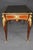 This handsome French Louis XV-style bronze-mounted writing desk, dating from the late nineteenth to early twentieth...