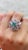 This is part of Chairish’s Fine Jewelry assortment. Emerald and ruby flower cocktail ring in 14K gold which perfectly goes...