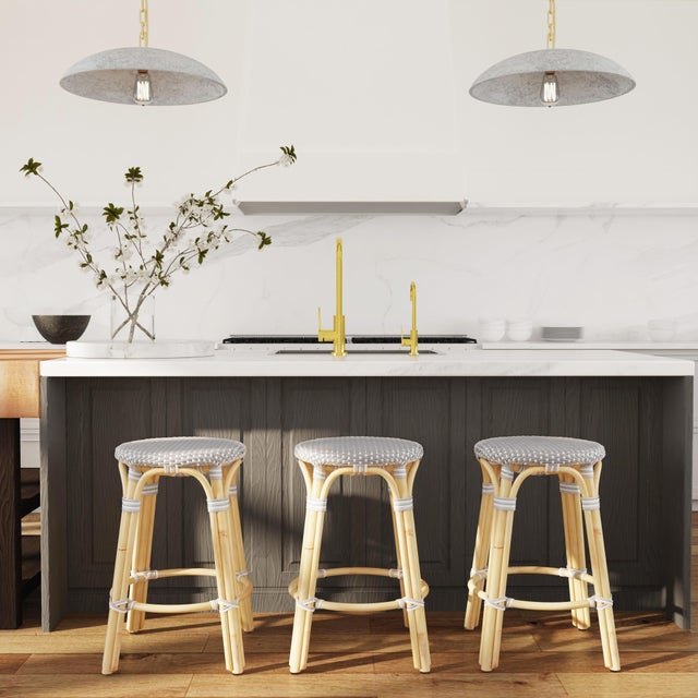 Evoking images of sidewalk tables in the Cote d'Azur, counter stools like this will give your kitchen or patio the casual...
