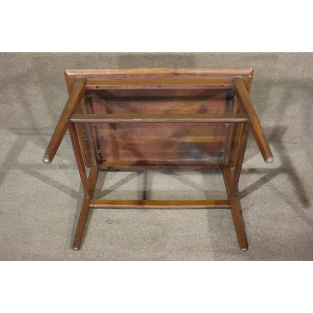 Pair of Mid-century modern walnut end tables fit for a variety of spaces besides just the bedroom. Large table top allows...