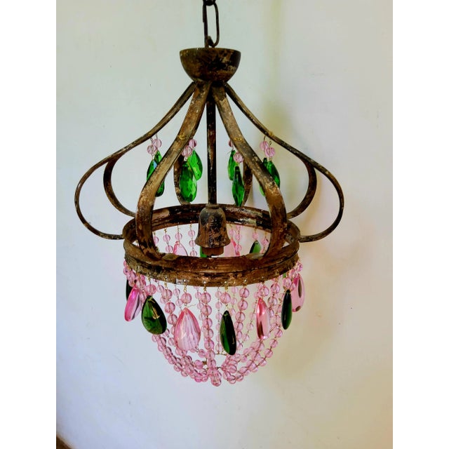 A French vintage crystal light pendant with pink and green crystal drops on a zinc frame. 1920 to 1949 Height 16.1 inch...