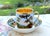 Antique Old Paris porcelain coffee cup and deep saucer, circa 1810–1820, with hand-painted pastoral landscape decoration...