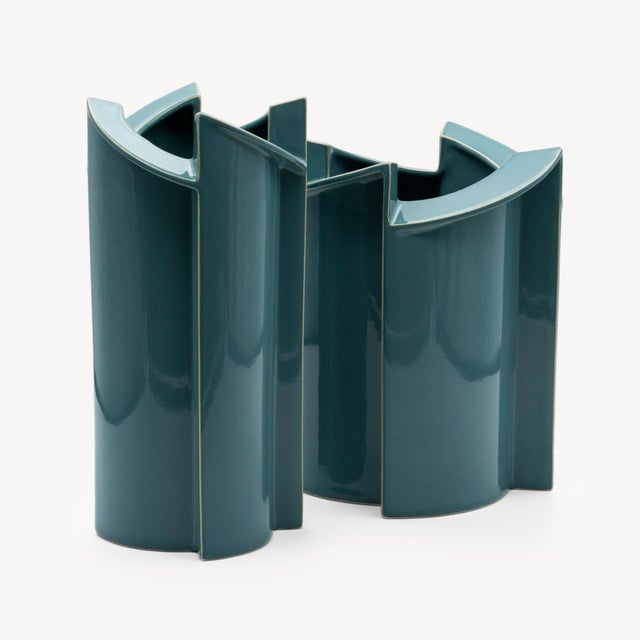 Set of two turquoise-glazed porcelain vases from the “Windmill” series, designed by Dutch ceramic artist Jan van der Vaart...