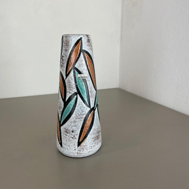 Article: Fat lava art vase, abstract floral illustration Producer: Scheurich, Germany Decade: 1970s This original vintage...