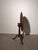The tabletop incorporates a traditional turn-and-flip mechanism , allowing the top to rotate and tilt into a vertical...