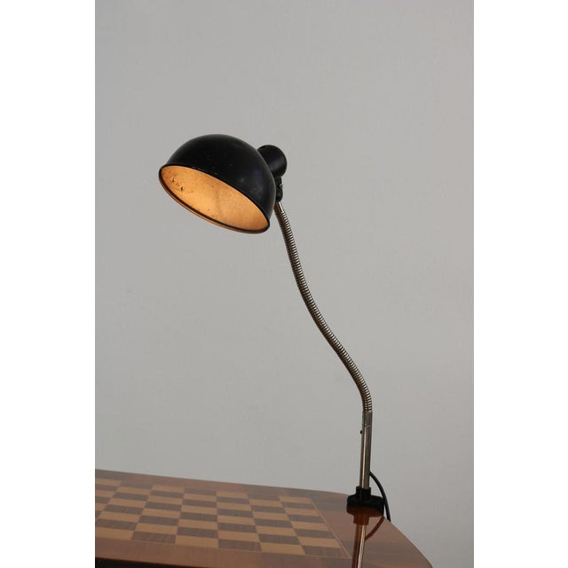 This Bauhaus lamp was designed by Christian Dell and made by Emperor Idell. It is made of painted aluminum and chrome...