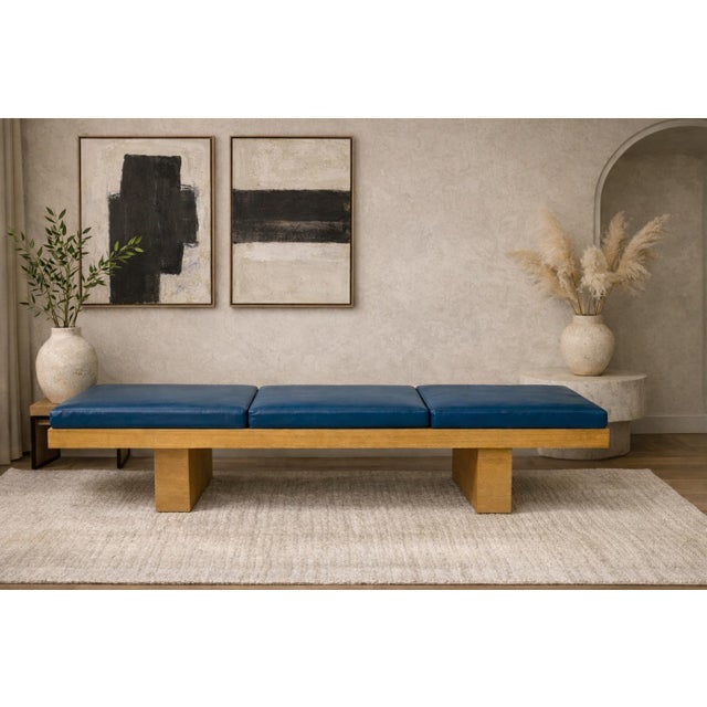 This custom modernist bench was designed and manufactured in Los Angeles, showcasing a refined architectural presence...
