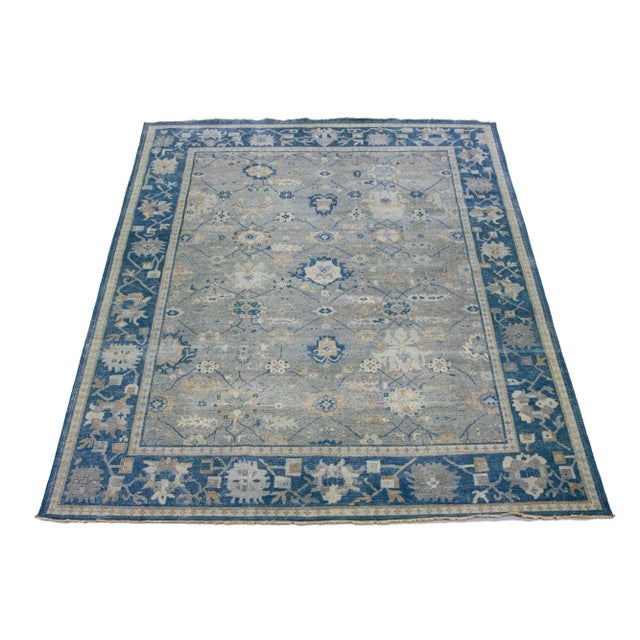 The Artisan line from Apadana infuses an exquisite antique style into any space. This hand-knotted rug exhibits a stunning...